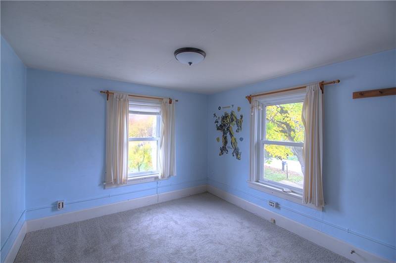 2248 Mercer Road New Brighton, PA 15066 - Photo 10 of 25 Bedroom 1 offers new carpeting, is nicely sized and faces the front and right side of the home.