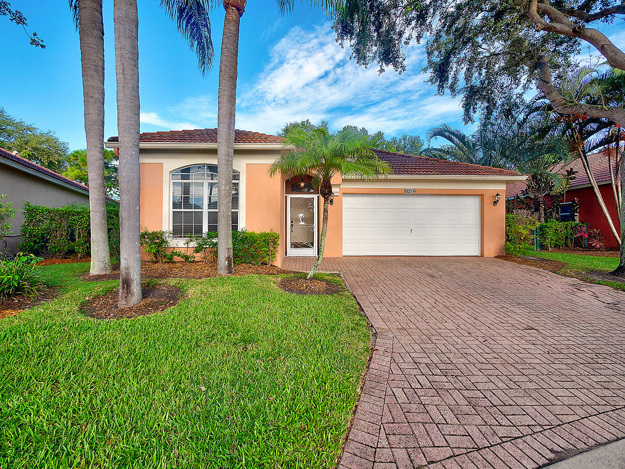 8059 Via Hacienda Riviera Beach, FL 33418 - Photo 1 of 18 Front