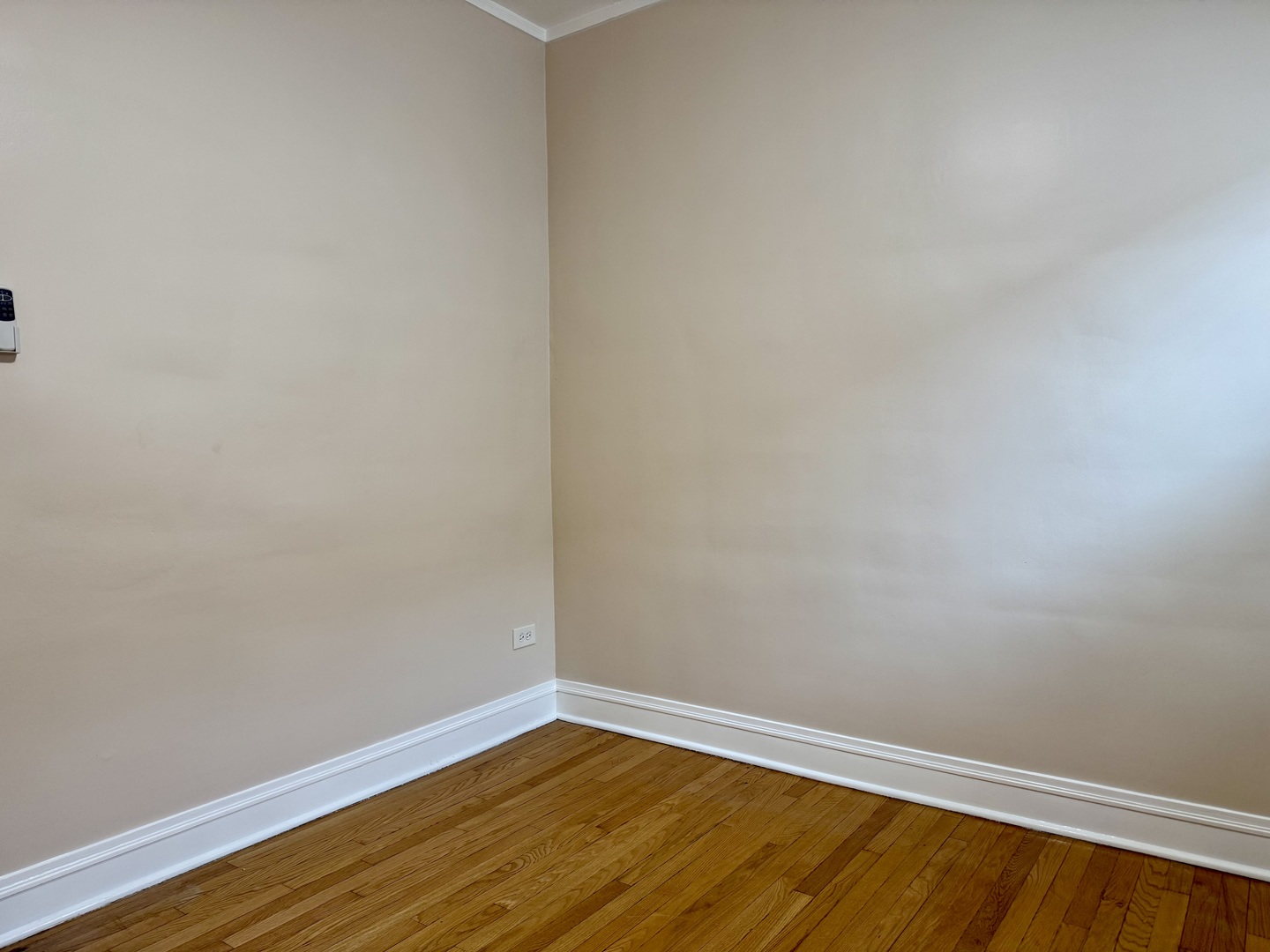 2125 Wesley Avenue, Unit 2 Berwyn, IL 60402 - Photo 12 of 26 a view of an empty room with wooden floor