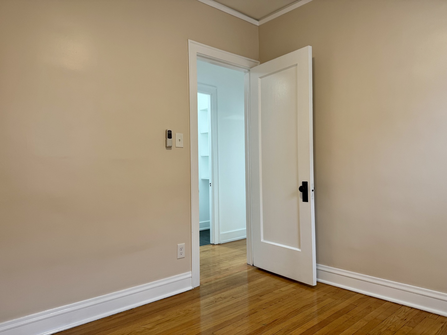 2125 Wesley Avenue, Unit 2 Berwyn, IL 60402 - Photo 18 of 26 a view of an empty room with wooden floor
