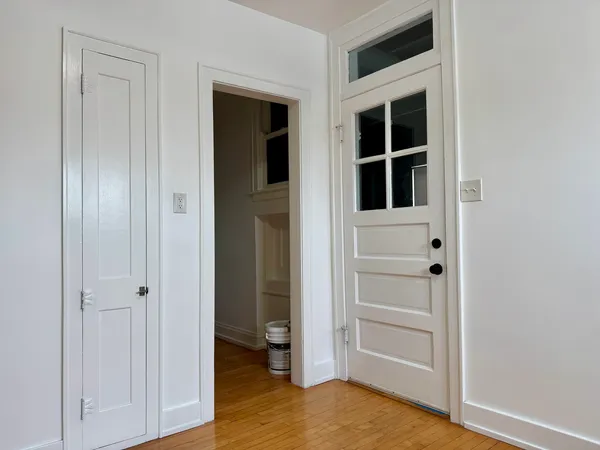 wooden floor with closet