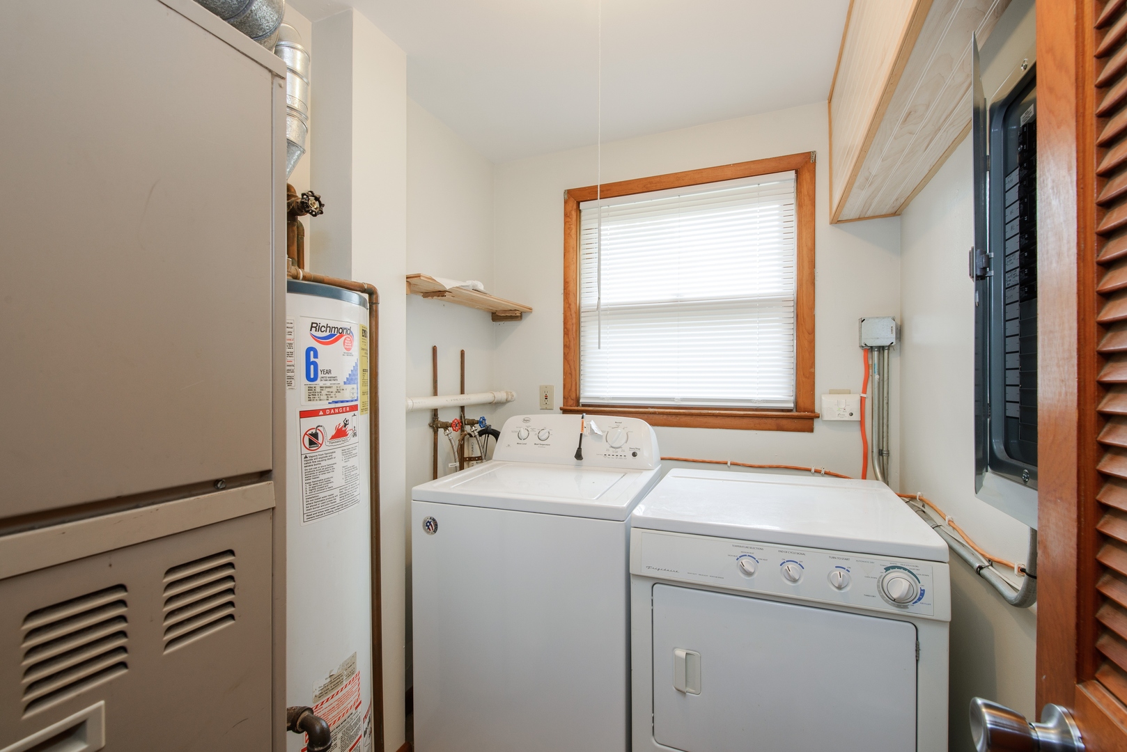 1529 Lewis Street DeKalb, IL 60115 - Photo 15 of 16 a utility room with dryer and washer