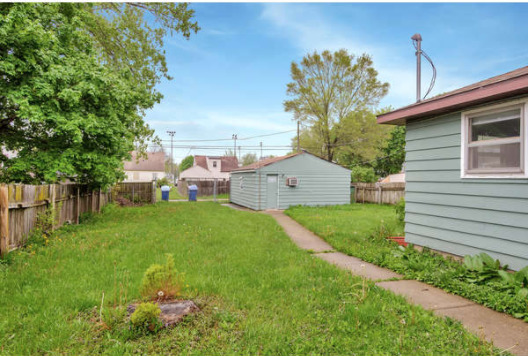 1529 Lewis Street DeKalb, IL 60115 - Photo 16 of 16 a view of a house with a backyard