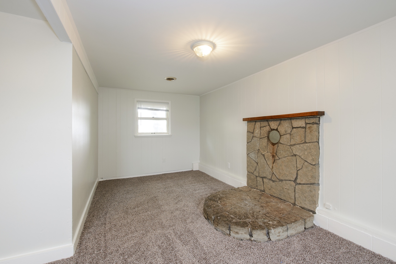 1529 Lewis Street DeKalb, IL 60115 - Photo 8 of 16 an empty room with windows