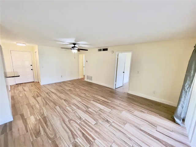a view of wooden floor in a bathroom