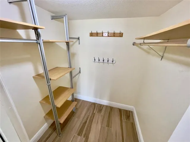 a bathroom with a sink double vanity granite and a mirror