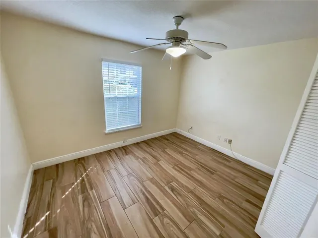 a bathroom with a sink mirror toilet and bathtub