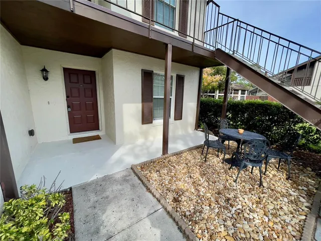 a bench sitting in front of a building