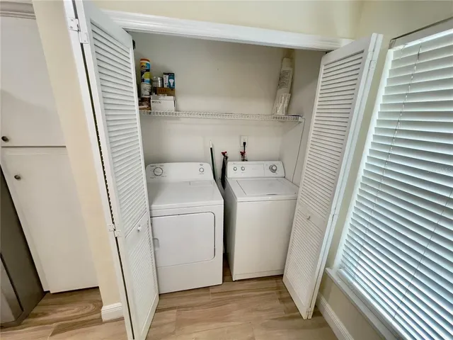 a view of livingroom with wooden floor