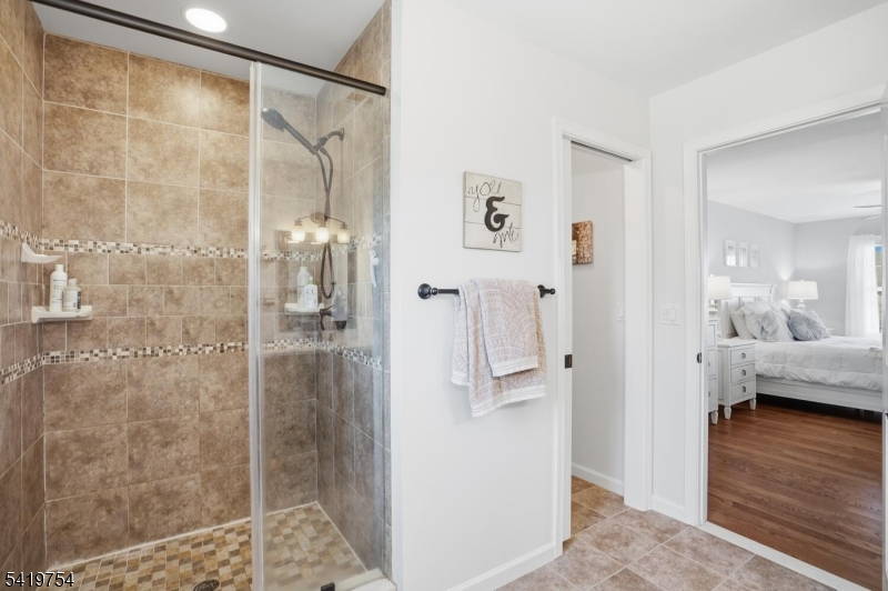 663 Harbor Road Brick, NJ 08724 - Photo 26 of 46 a bathroom with a shower and a sink