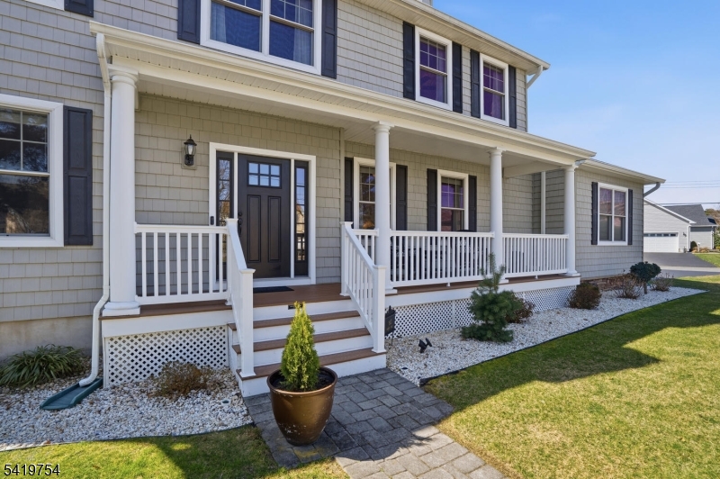 663 Harbor Road Brick, NJ 08724 - Photo 3 of 46 a front view of a house with a yard