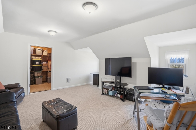 663 Harbor Road Brick, NJ 08724 - Photo 33 of 46 a view of a workspace with furniture and a couch