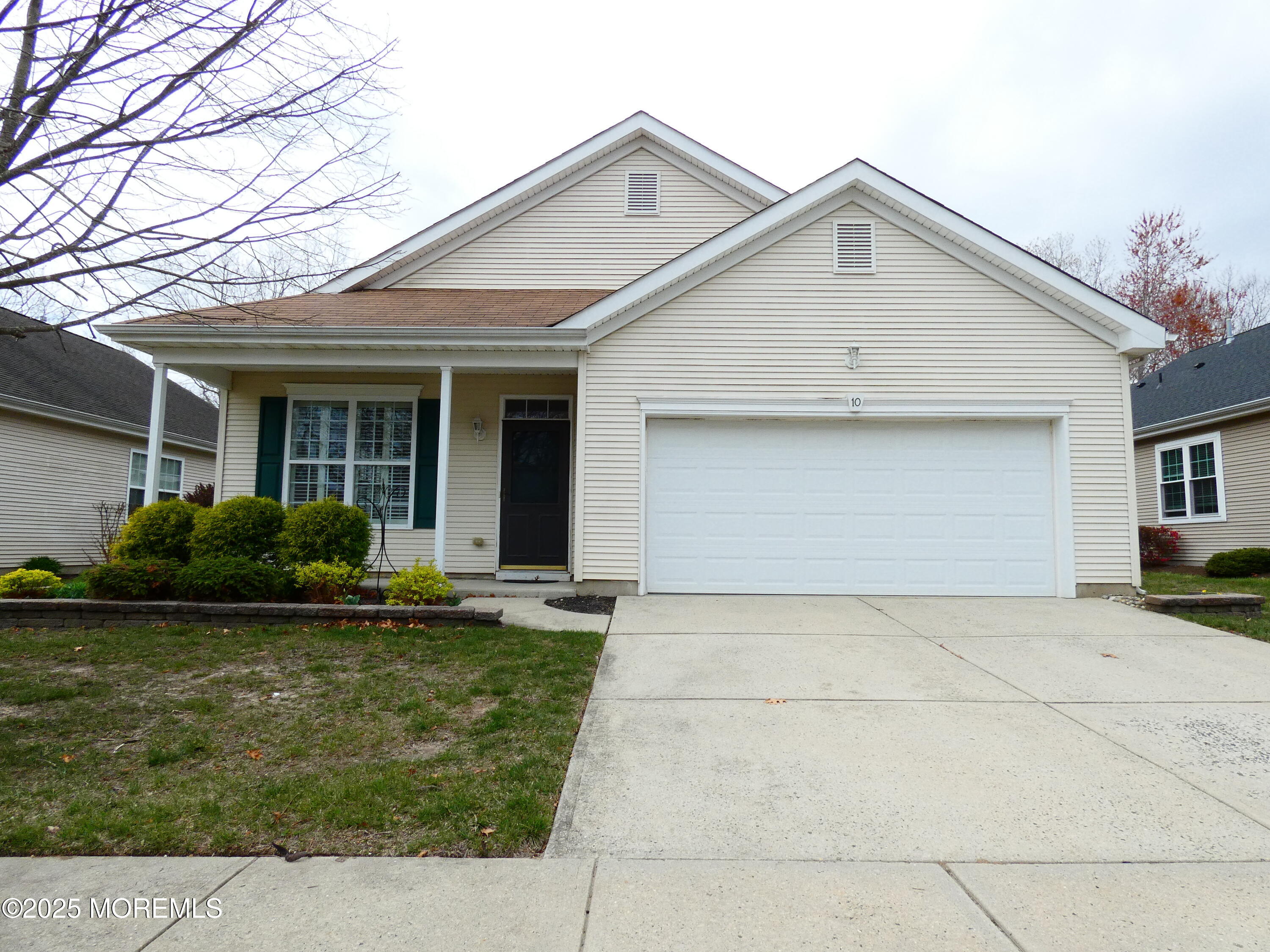 10 Lilly Drive Little Egg Harbor, NJ 08087 - Photo 1 of 28 a front view of a house with a yard