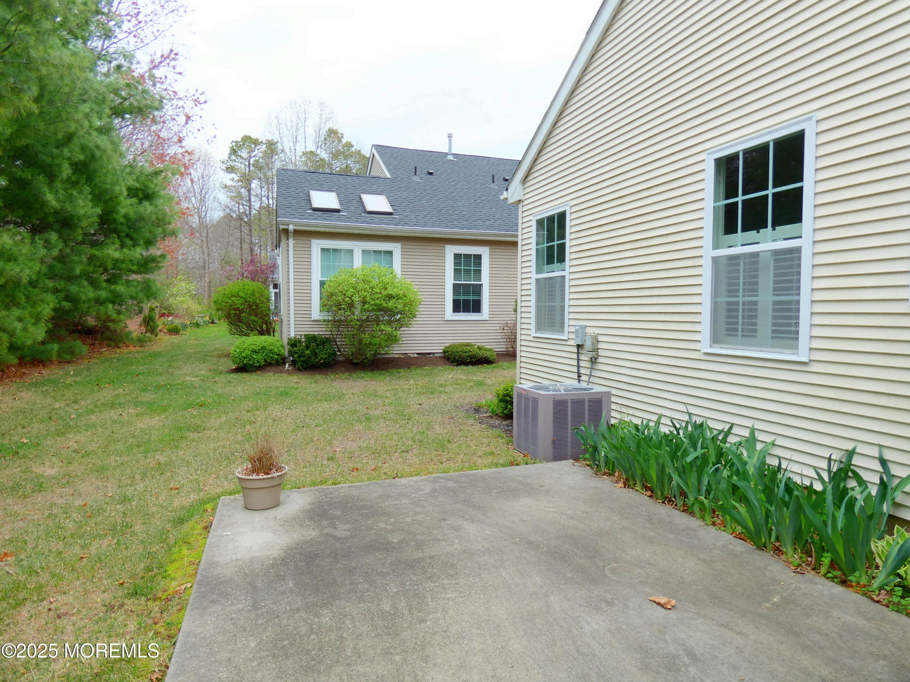 10 Lilly Drive Little Egg Harbor, NJ 08087 - Photo 23 of 28 a view of a house with a garden