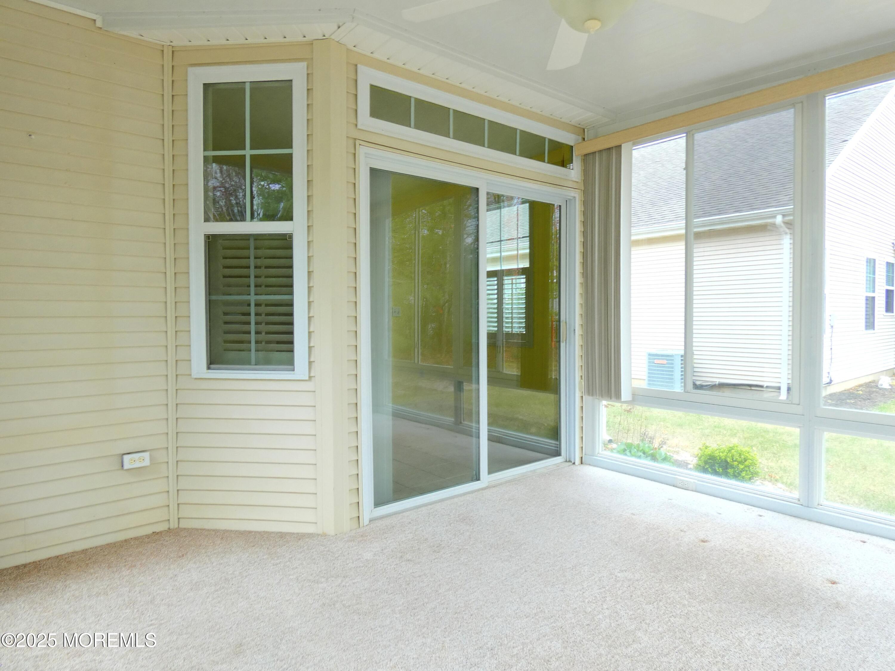 10 Lilly Drive Little Egg Harbor, NJ 08087 - Photo 24 of 28 a view of an empty room with a window