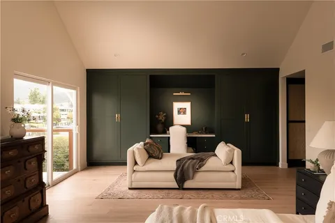 a view of cabinet with mirror