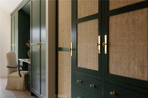 a bathroom with a granite countertop sink mirror and shower