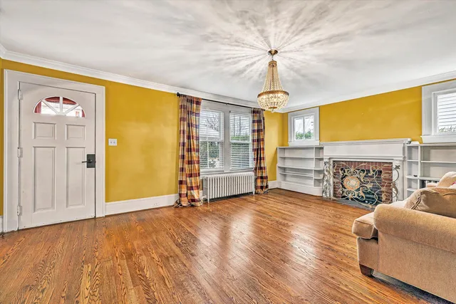 a view of livingroom with hardwood floor and a ceiling fan
