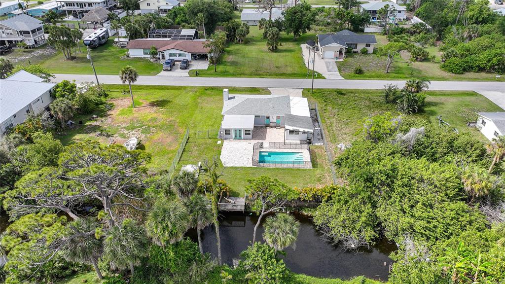 8164 Archie Street Englewood, FL 34224 - Photo 40 of 42 an aerial view of residential houses with outdoor space and lake view
