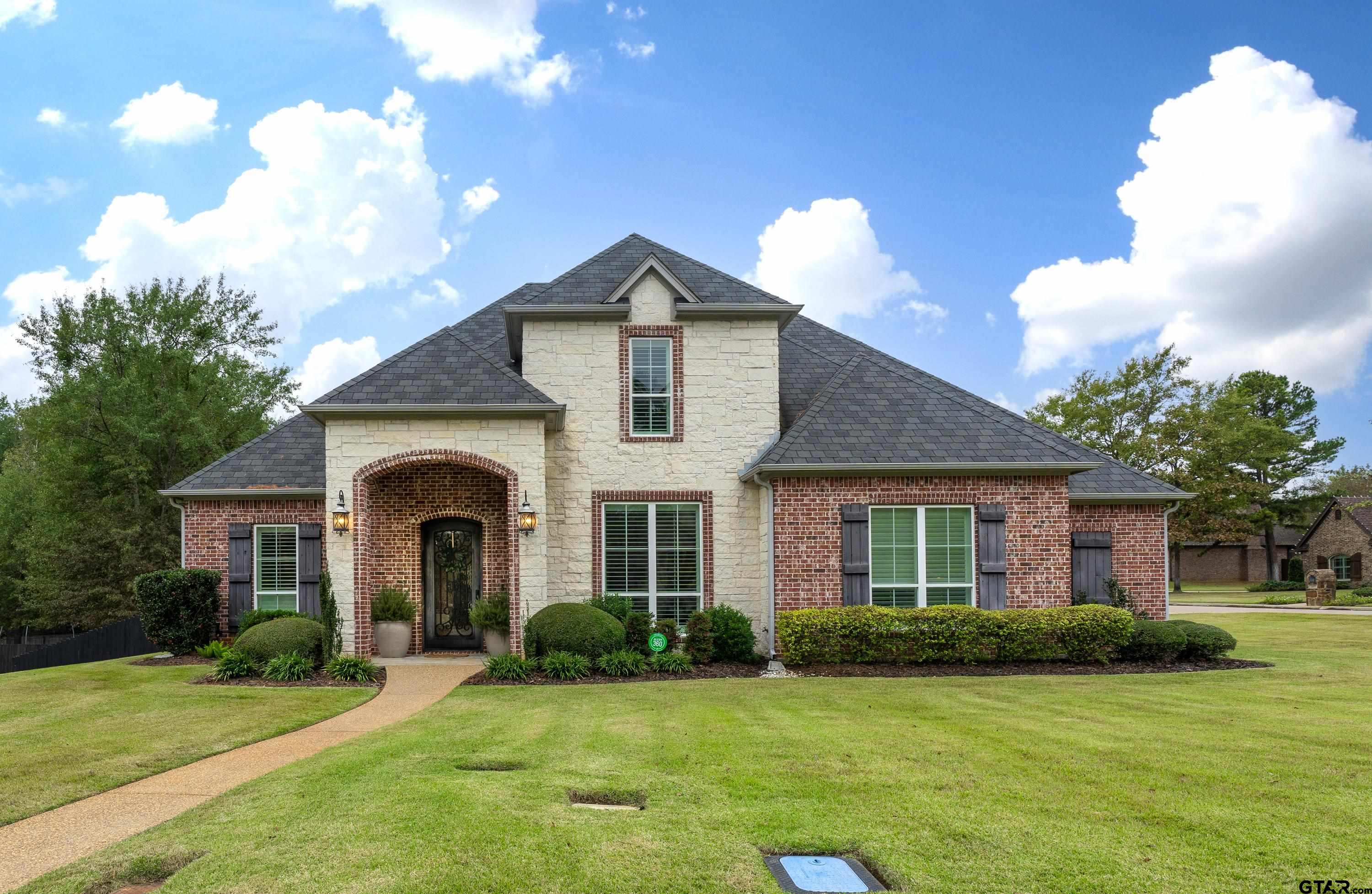 3901 Chase Crest Circle Longview, TX 75605 - Photo 1 of 44 a front view of a house with a yard