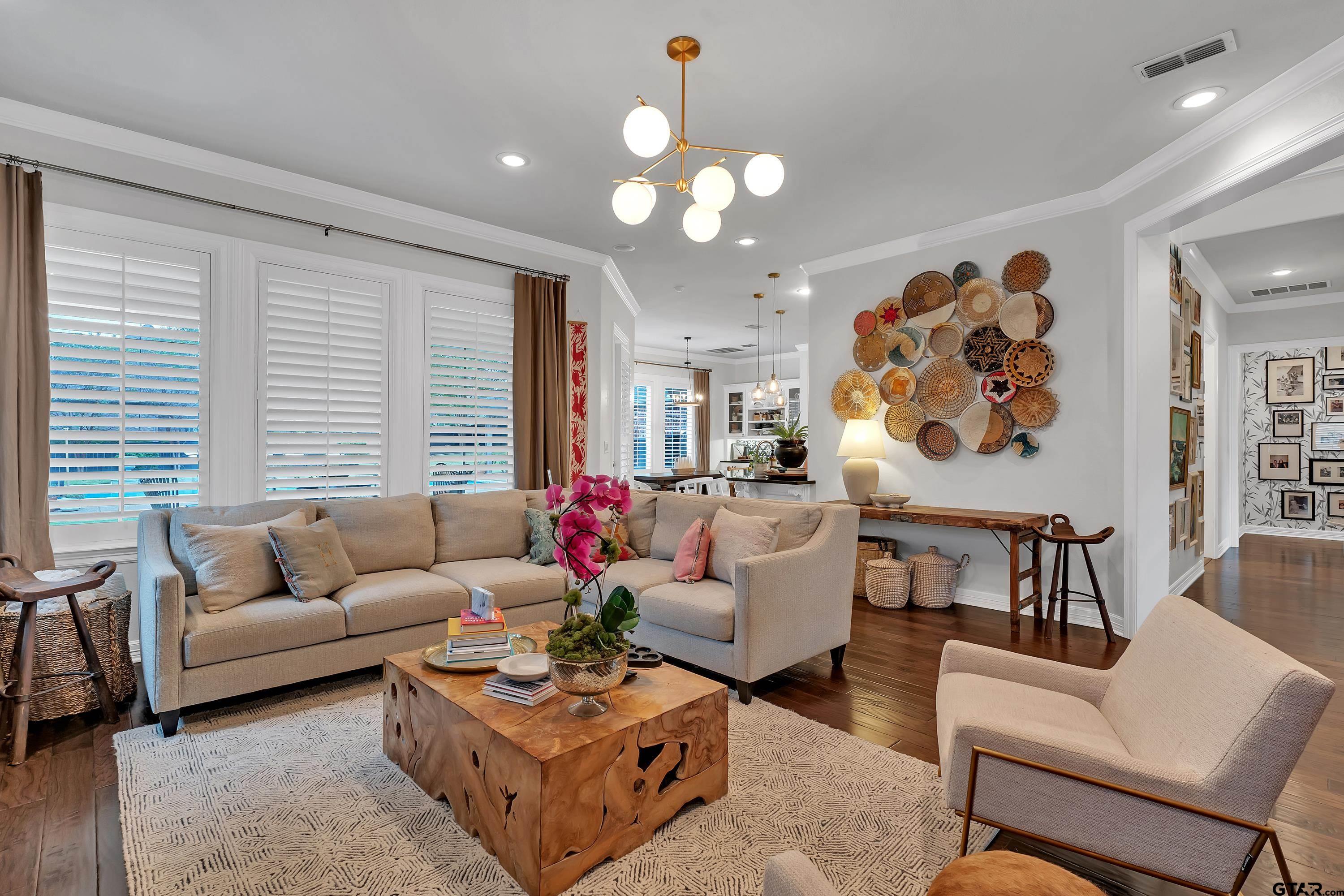 3901 Chase Crest Circle Longview, TX 75605 - Photo 11 of 44 a living room with furniture and a large window