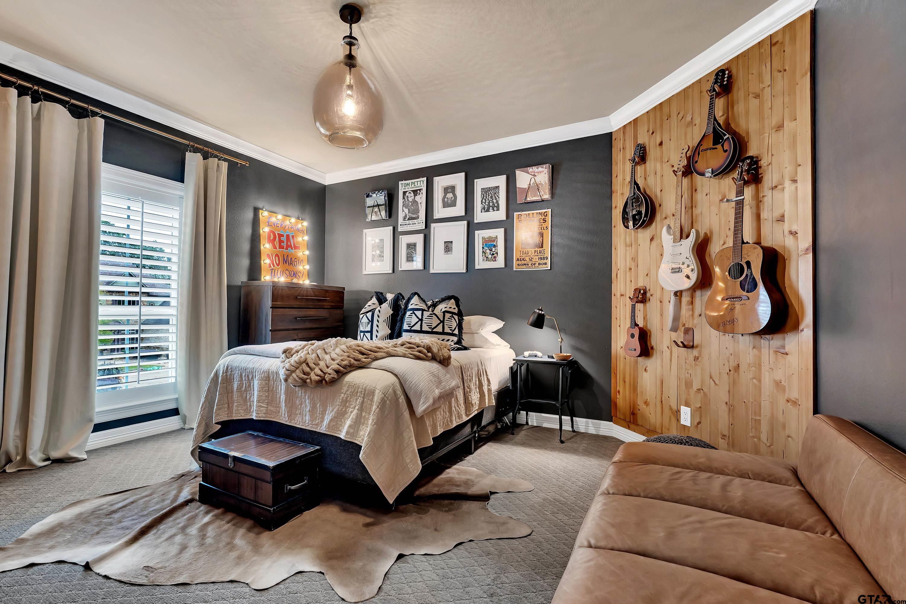 3901 Chase Crest Circle Longview, TX 75605 - Photo 30 of 44 a spacious bedroom with a bed and a window