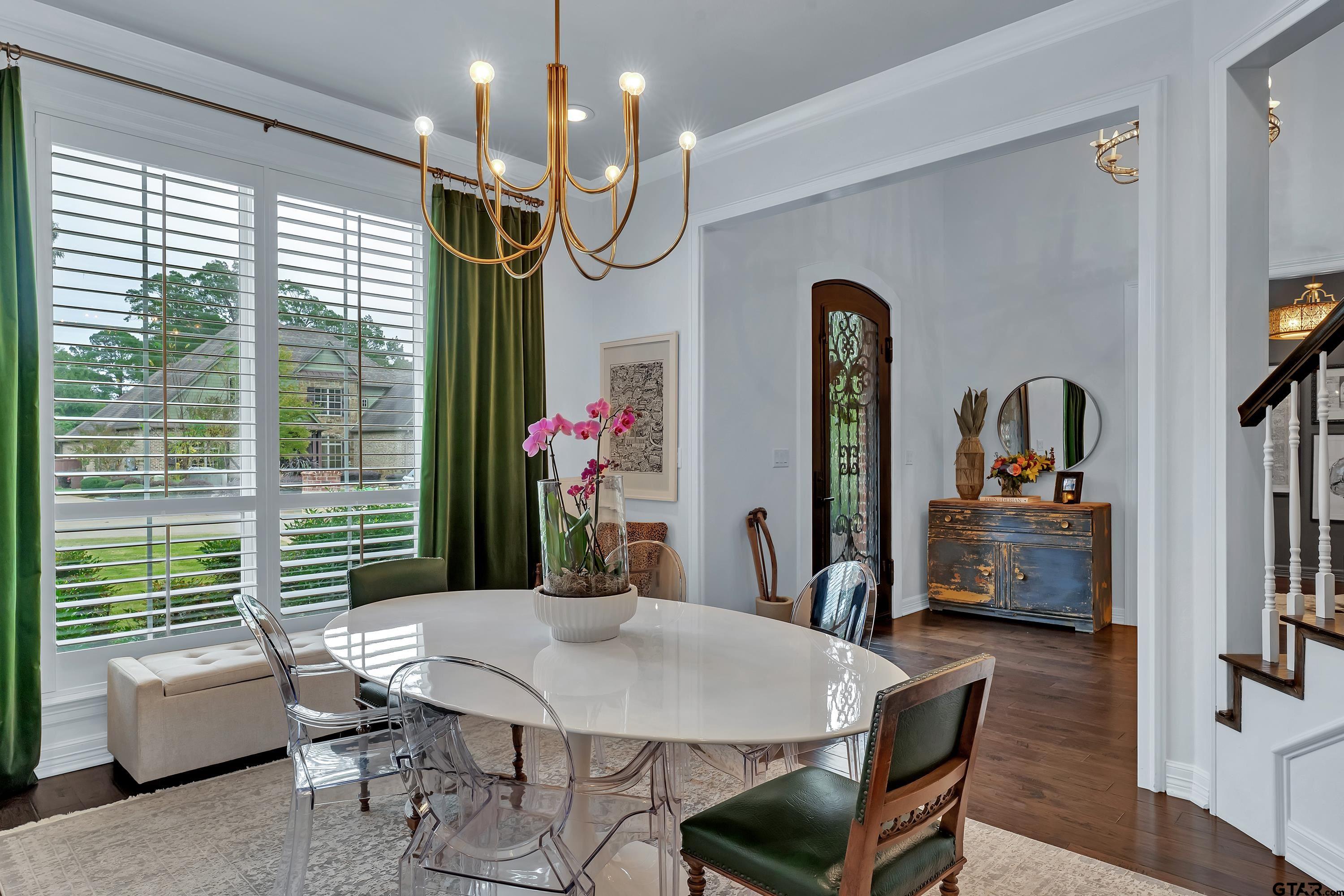 3901 Chase Crest Circle Longview, TX 75605 - Photo 4 of 44 a view of a dining room with furniture window and wooden floor