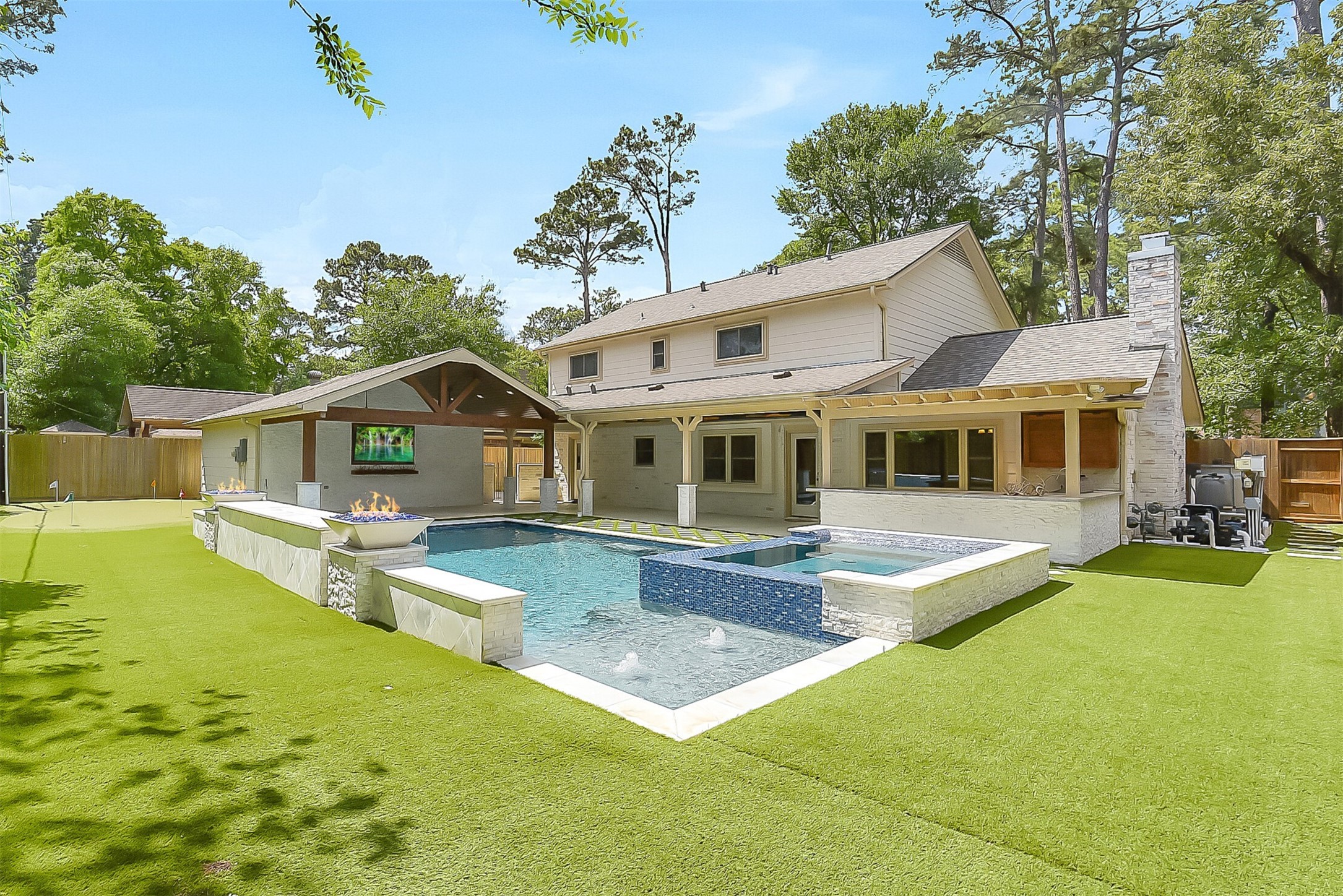 9519 Oxted Lane Spring, TX 77379 - Photo 2 of 40 a front view of house with yard slide and large tree