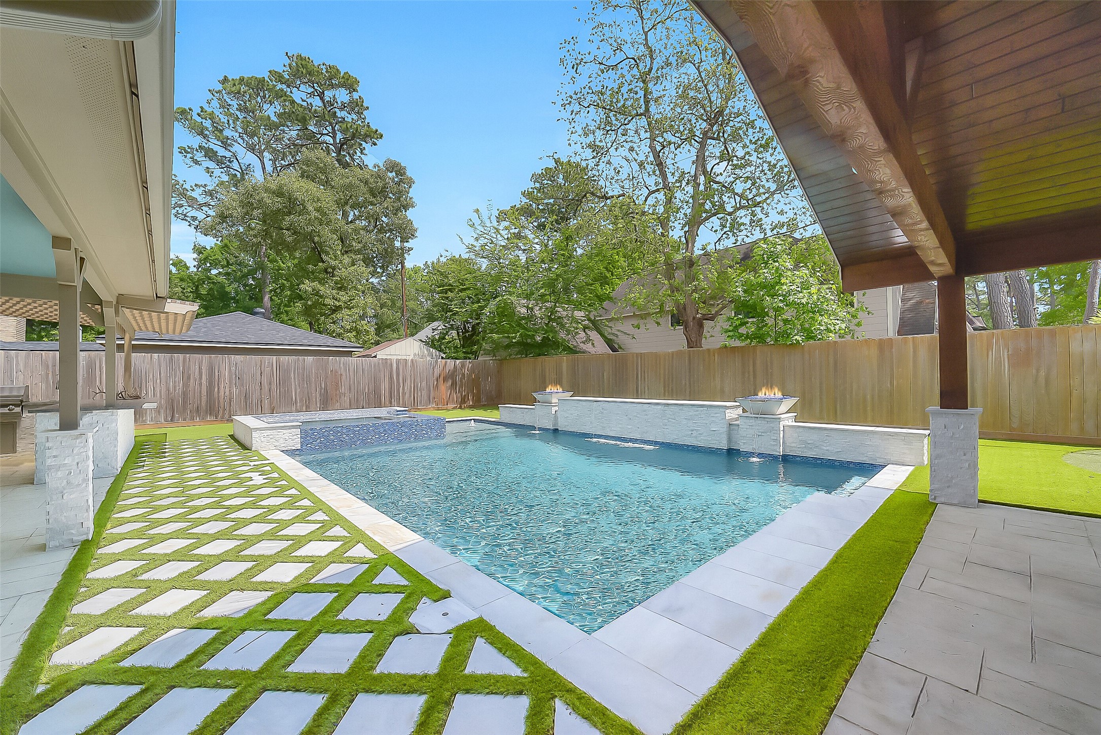 9519 Oxted Lane Spring, TX 77379 - Photo 25 of 40 a view of a backyard with a slide