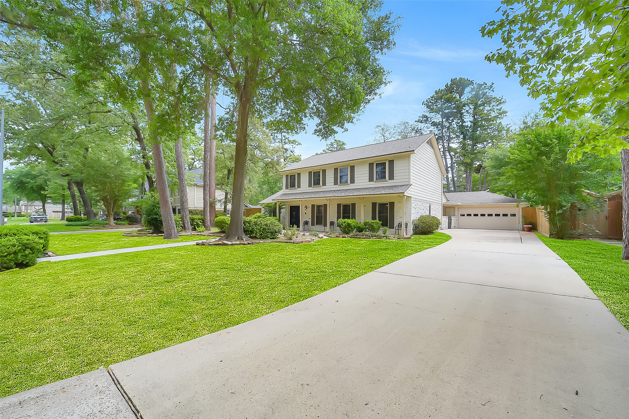 9519 Oxted Lane Spring, TX 77379 - Photo 35 of 40 a front view of house with yard and green space