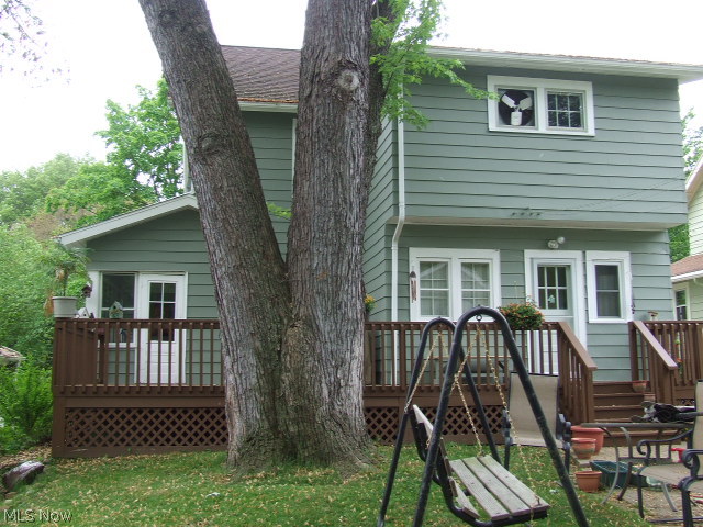 653 Ecton Road Akron, OH 44303 - Photo 23 of 25 View of the back of the house and deck, two back doors.