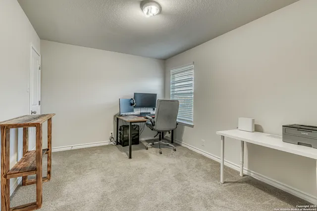 a room with air conditioner and a window