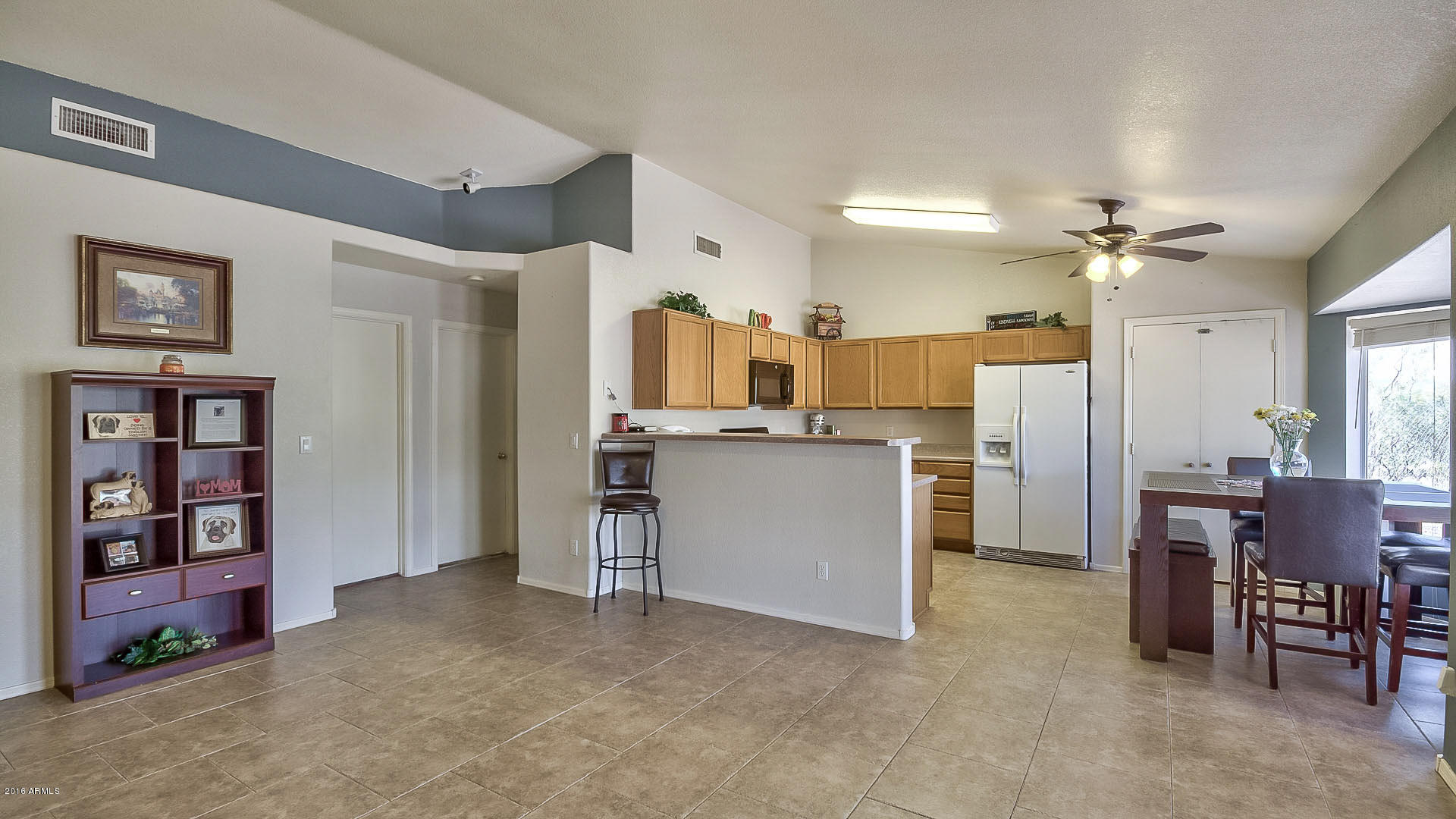 2001 South Mountain View Road Apache Junction, AZ 85119 - Photo 46 of 46 a view of kitchen with furniture and wooden cabinets