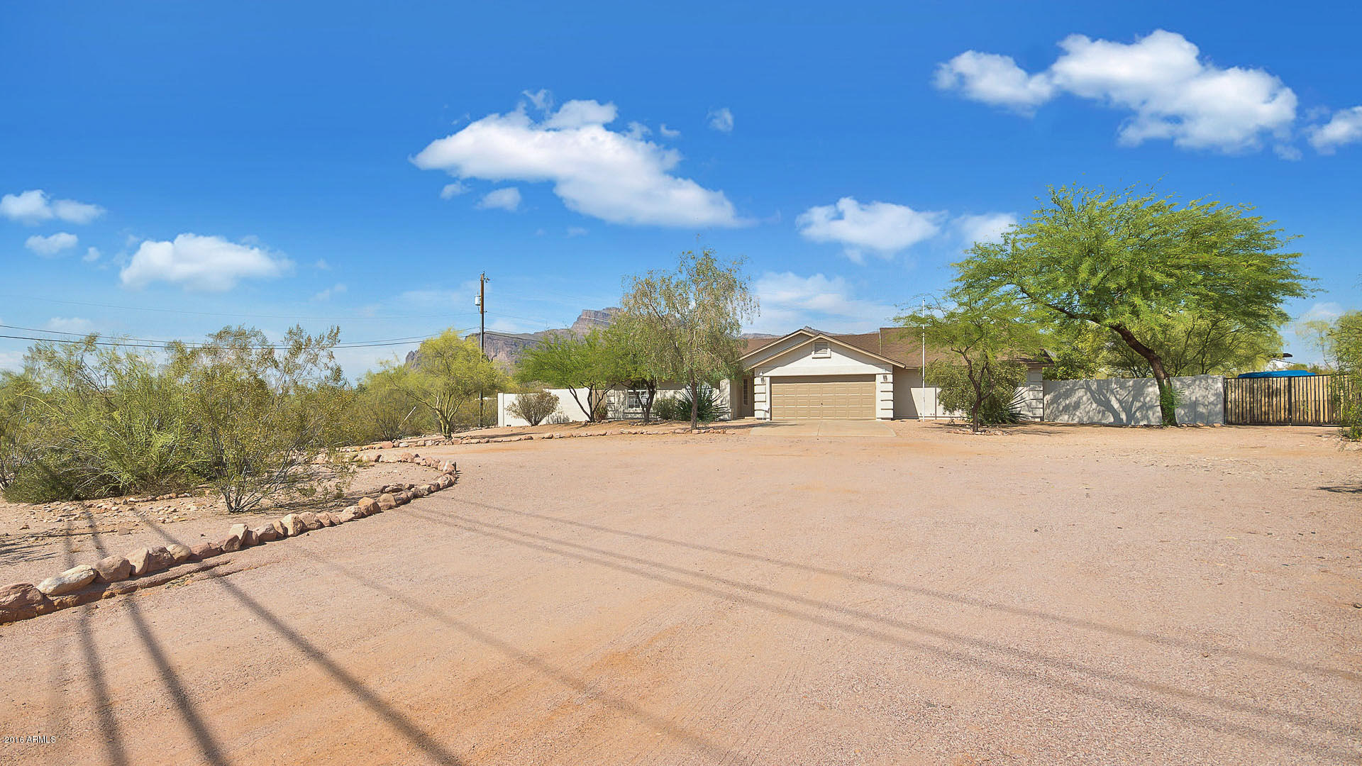 2001 South Mountain View Road Apache Junction, AZ 85119 - Photo 18 of 46 a view of a road with a building in the background