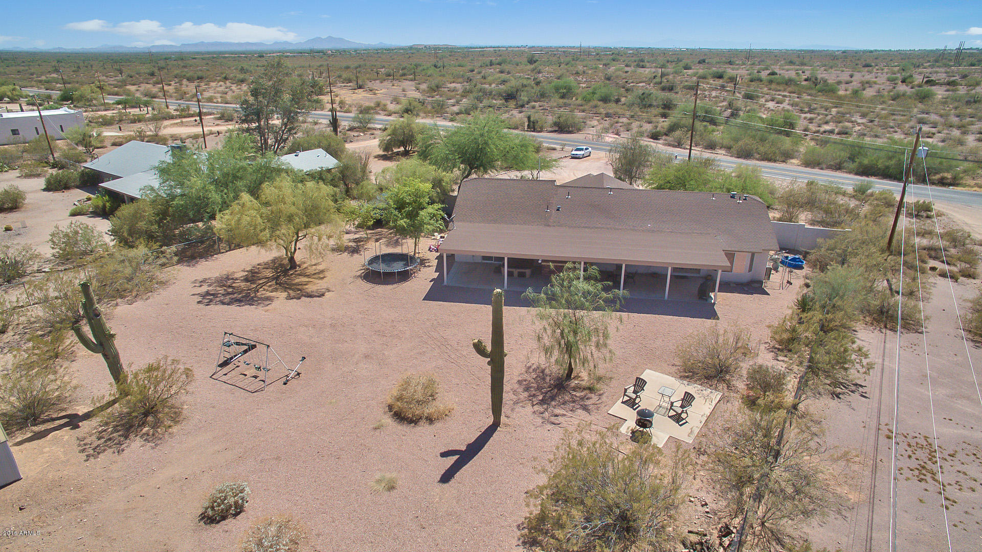 2001 South Mountain View Road Apache Junction, AZ 85119 - Photo 20 of 46 an aerial view of a house with a yard