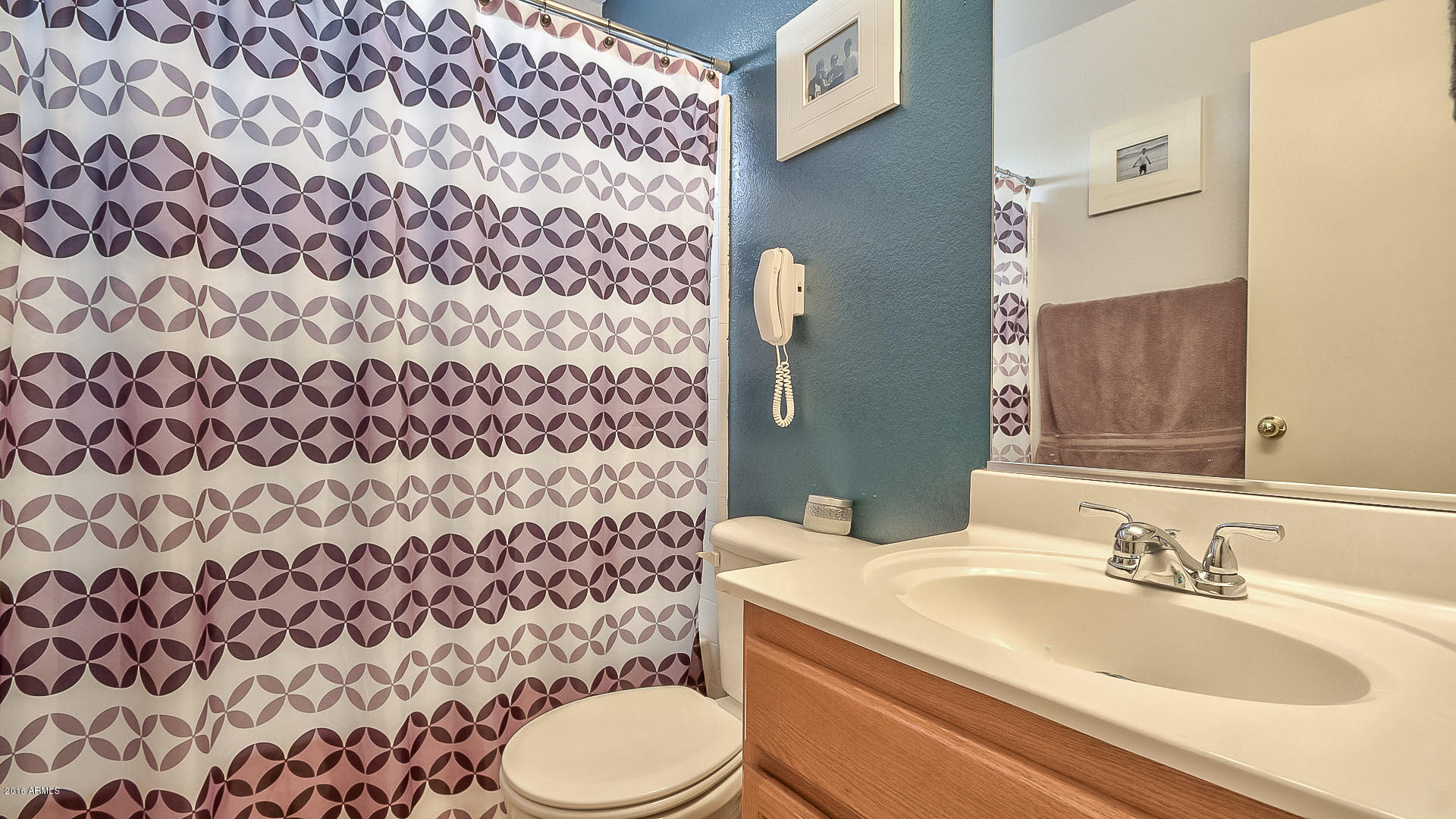 2001 South Mountain View Road Apache Junction, AZ 85119 - Photo 21 of 46 a bathroom with a sink toilet and shower
