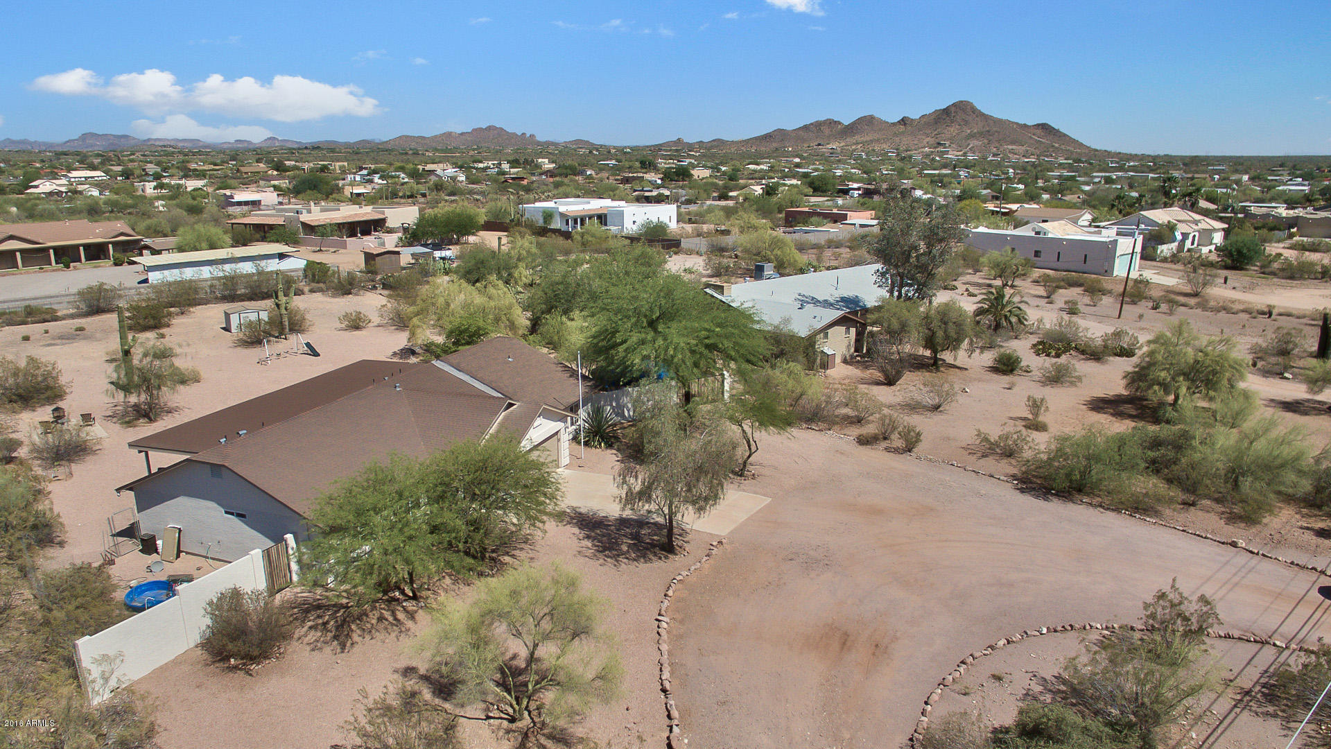2001 South Mountain View Road Apache Junction, AZ 85119 - Photo 22 of 46 an aerial view of residential houses with outdoor space