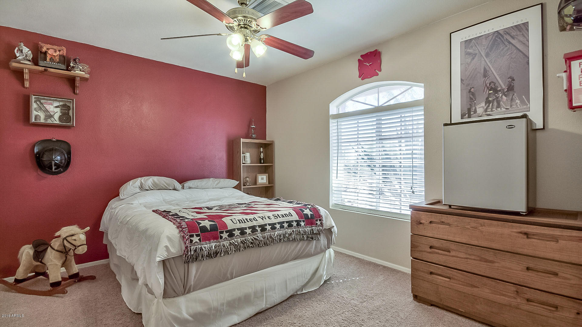 2001 South Mountain View Road Apache Junction, AZ 85119 - Photo 5 of 46 a bedroom with a bed and a chandelier