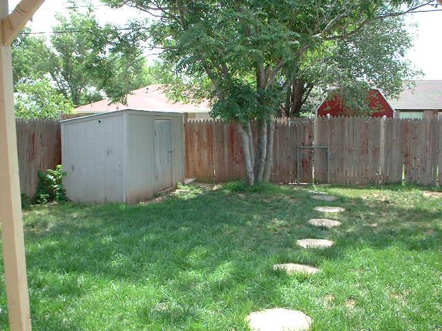 5105 Susan Drive Amarillo, TX 79110 - Photo 8 of 8 a backyard of a house