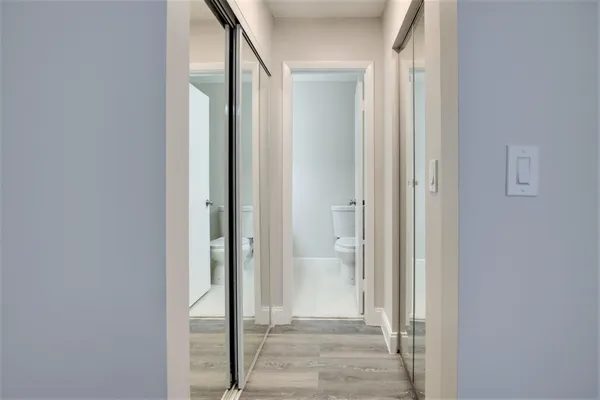 a bathroom with a shower and a toilet