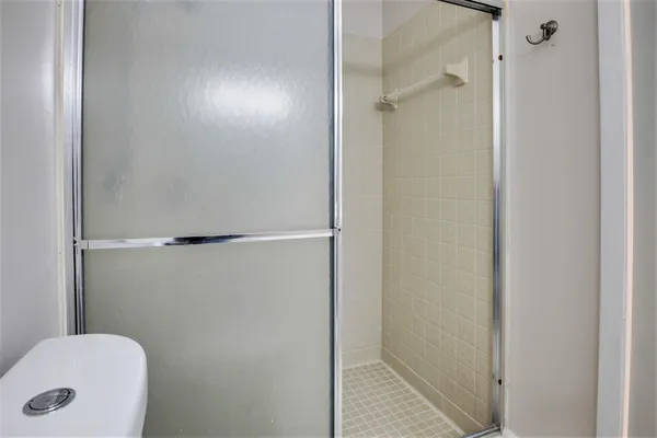 a view of a room with racks on the wall