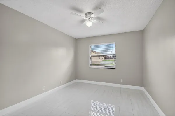 a bathroom with a sink toilet tub and shower