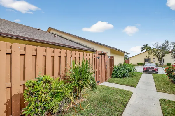 a car parked in front of a house