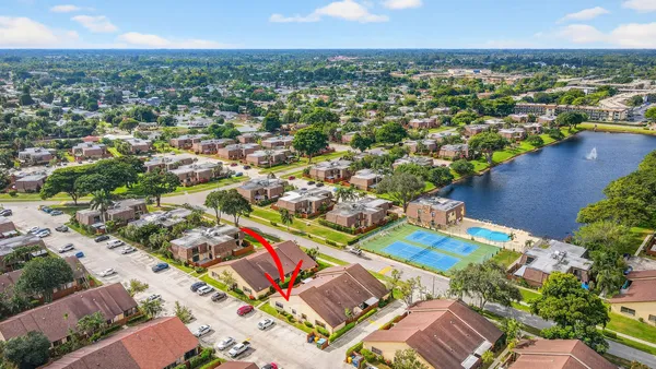 a view of a swimming pool with outdoor space and lake view