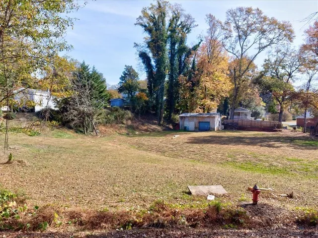 a fire hydrant in the middle of a field