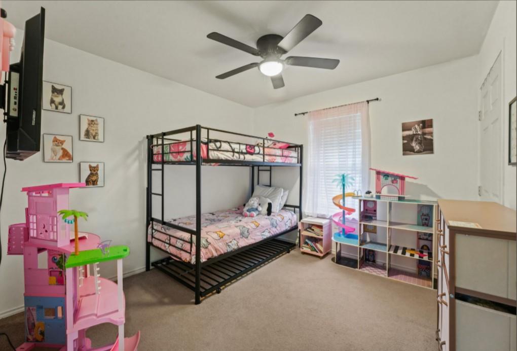 209 Mill Street Lone Oak, TX 75453 - Photo 15 of 29 Carpeted bedroom featuring ceiling fan