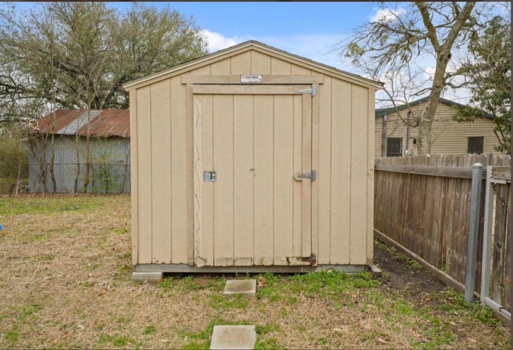 209 Mill Street Lone Oak, TX 75453 - Photo 22 of 29 View of shed with fence
