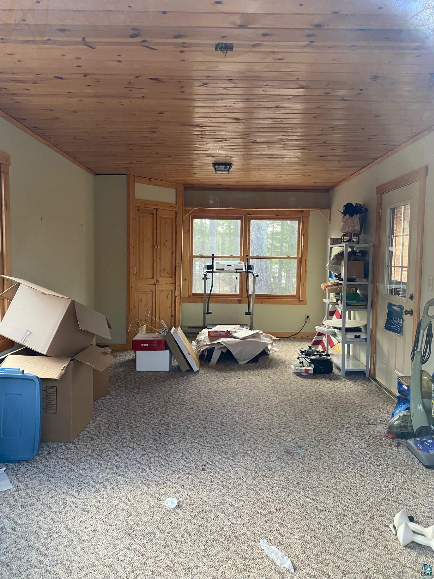 11316 East Timber Ridge Drive Lake Nebagamon, WI 54849 - Photo 22 of 27 Interior space with wooden ceiling and carpet floors