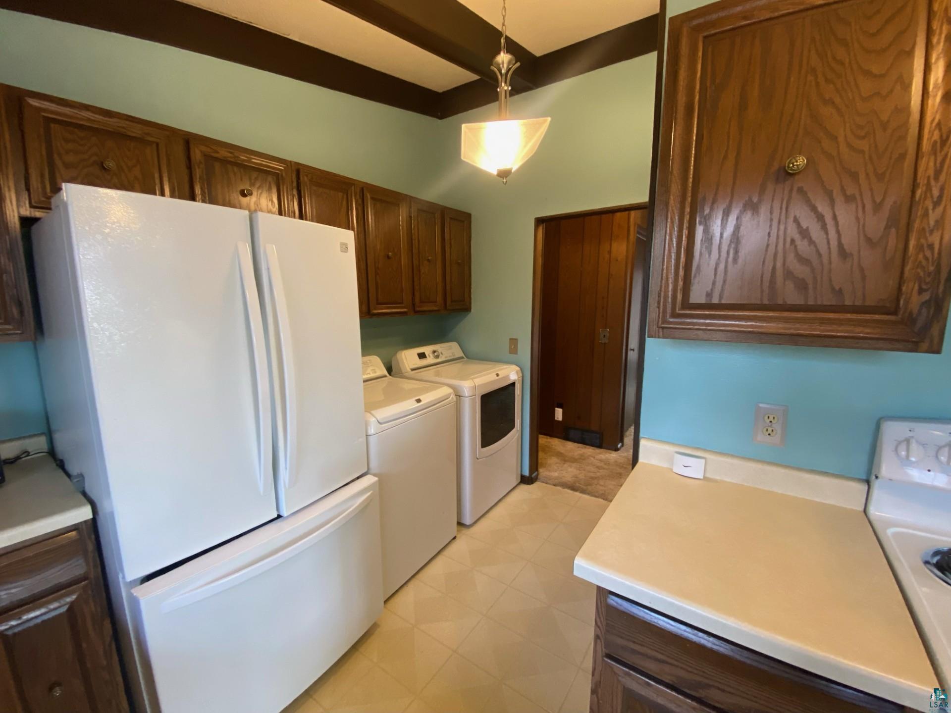 11316 East Timber Ridge Drive Lake Nebagamon, WI 54849 - Photo 9 of 27 Clothes washing area with independent washer and dryer