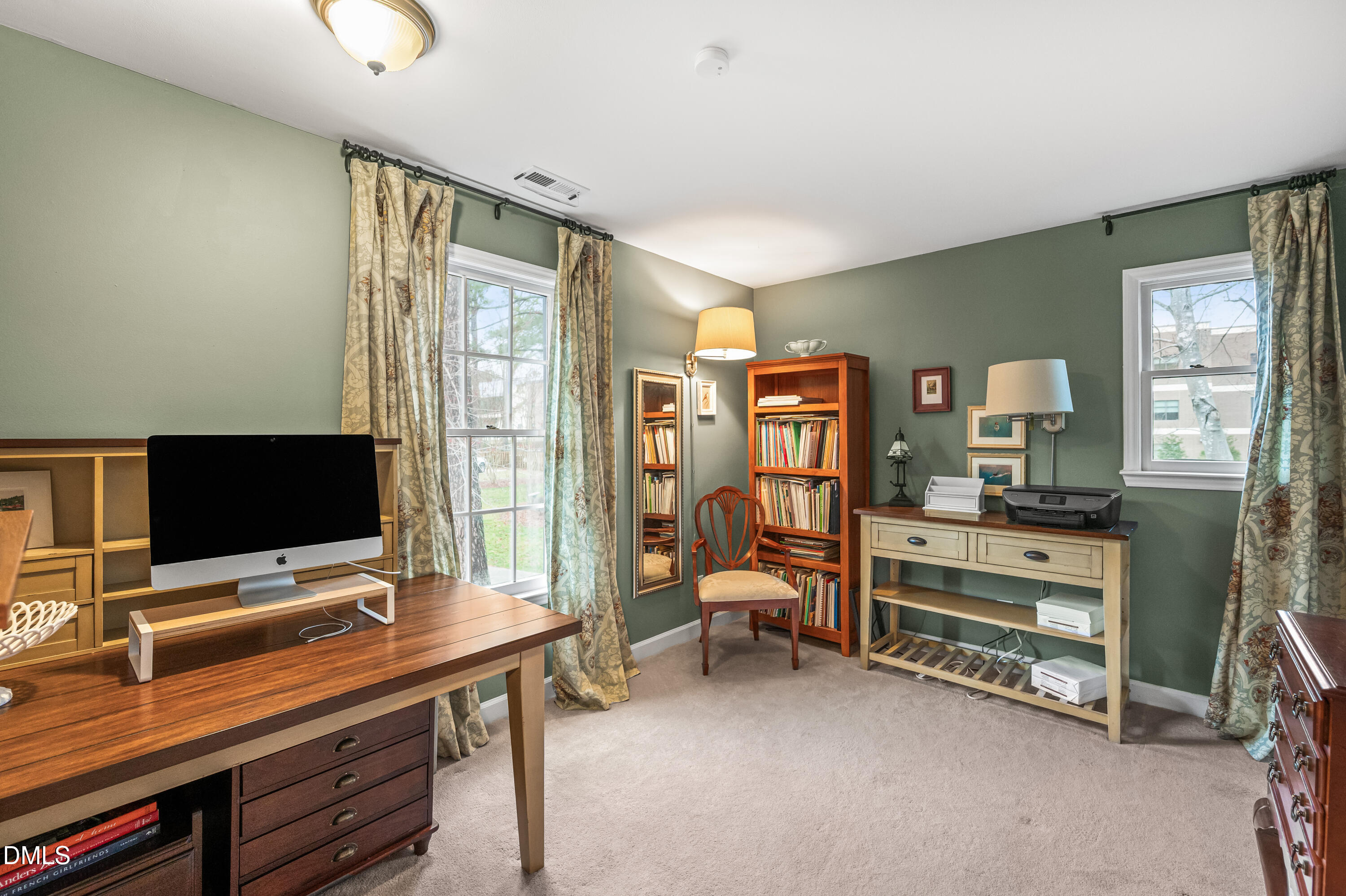 8304 North Crestwyck Court Raleigh, NC 27615 - Photo 26 of 40 a view of a workspace with furniture and a window